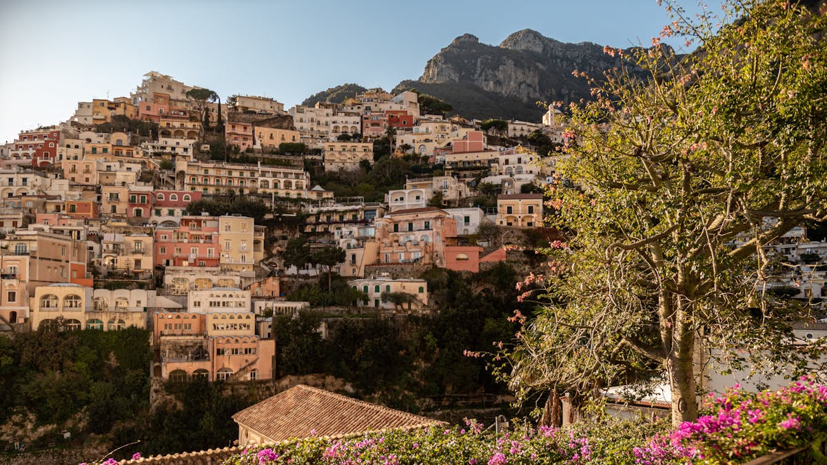 Day Trips from Positano Italy: Top Spots to Explore Nearby 1 Day trips from Positano Italy - Amalfi Coast scenic cliffside village with turquoise sea views