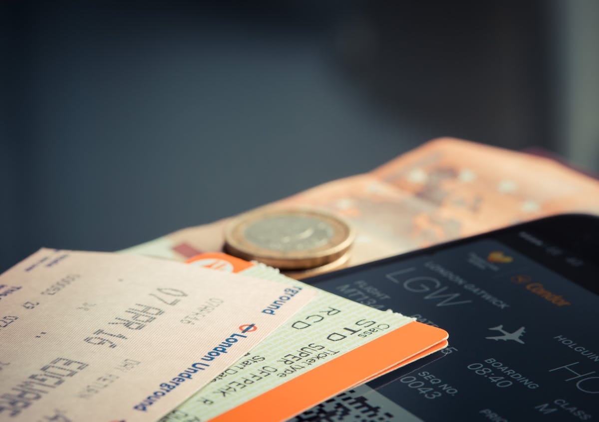Airline ticket and boarding pass showing flight number location for easy reference at airport