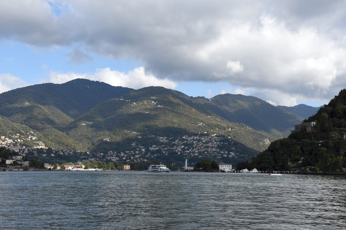 Day Trips from Lake Como to Switzerland: Top Spots to Explore 1 Day trips from Lake Como to Switzerland - striking alpine lake views with mountains and Italian villas