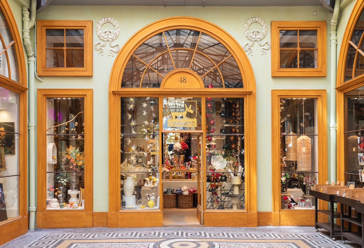 Luxury Gifts from Paris: Exquisite Finds for Every Occasion 1 Elegant storefront of a boutique in the historic Galerie Vivienne, Paris.