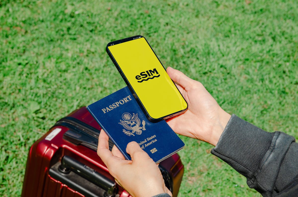 Traveler using smartphone with international data connection and VPN for secure travel connectivity