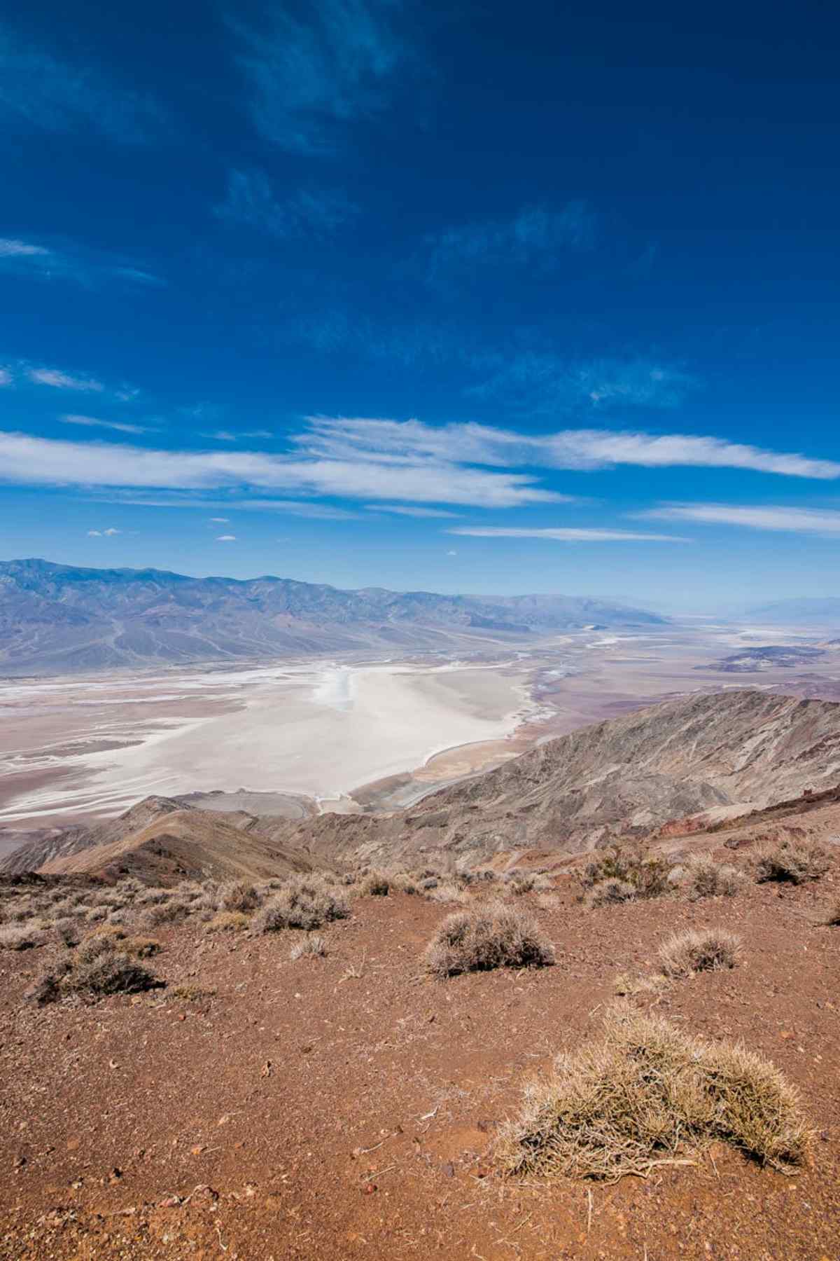 Desert Escape: Best Luxury Hotels in Joshua Tree 5 Breathtaking landscape of Death Valley with rugged mountains and desert under vibrant blue sky