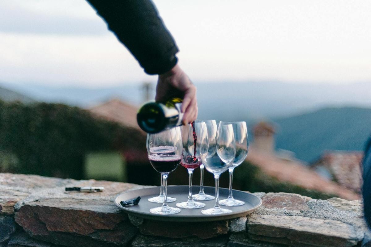 Wine tasting at a black owned winery in Napa featuring red wine glasses