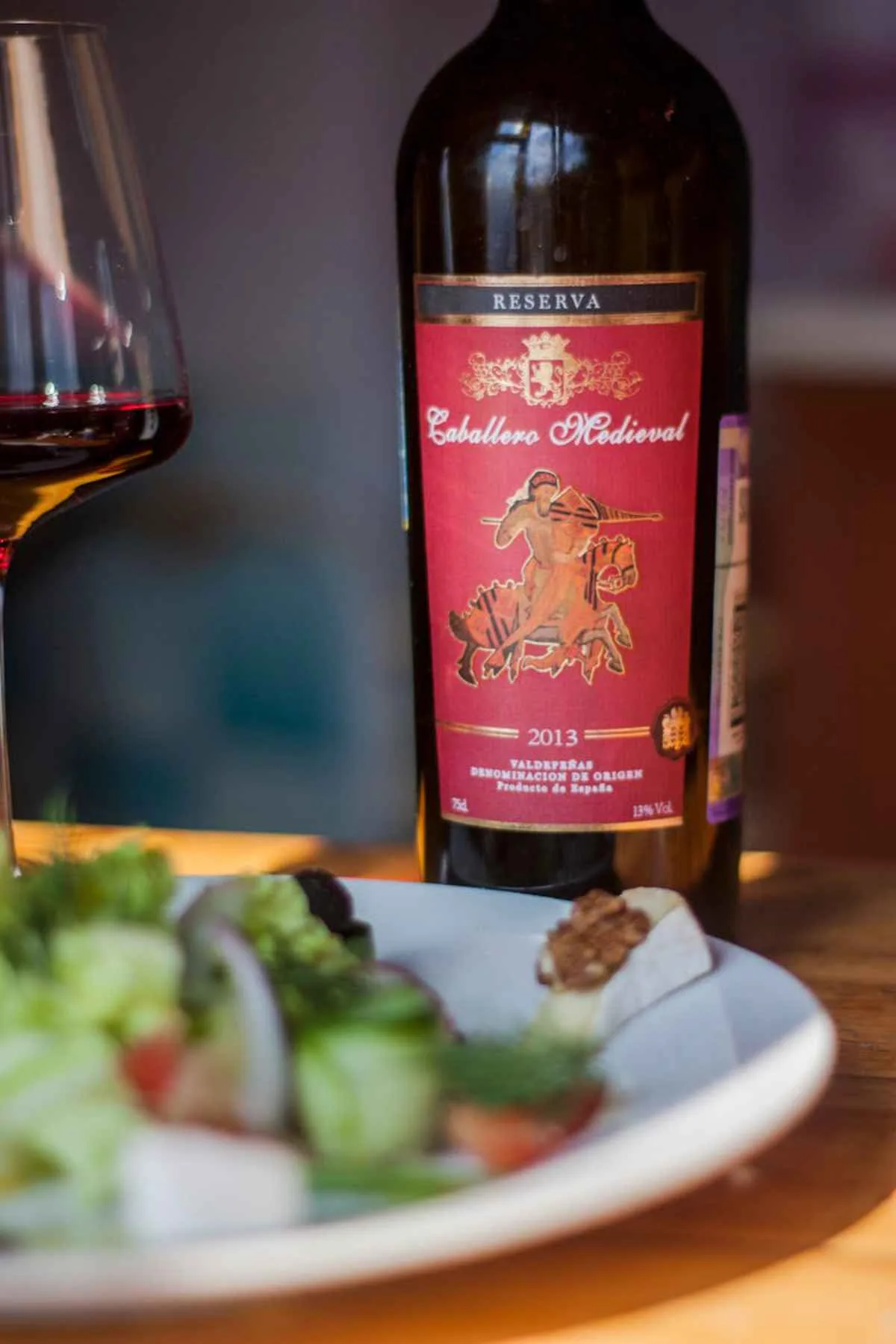 Food Pairing with Zinfandel: Perfect Matches for Every Meal 10 Bottle of red wine paired with a fresh salad elegant dining experience