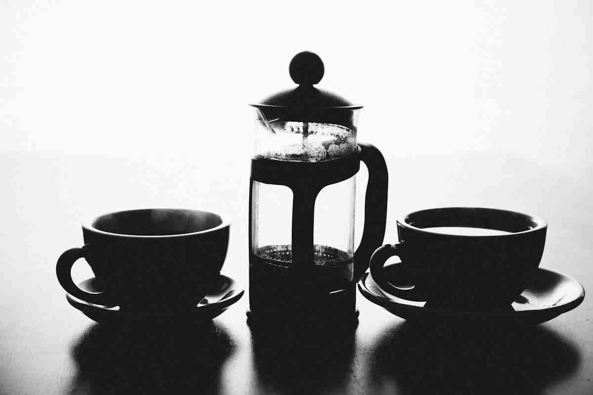 Best Pre Ground Coffee for French Press: Top Picks for a Rich Brew 2 Pre-ground coffee grounds dark roast in a bowl ready for French press brewing