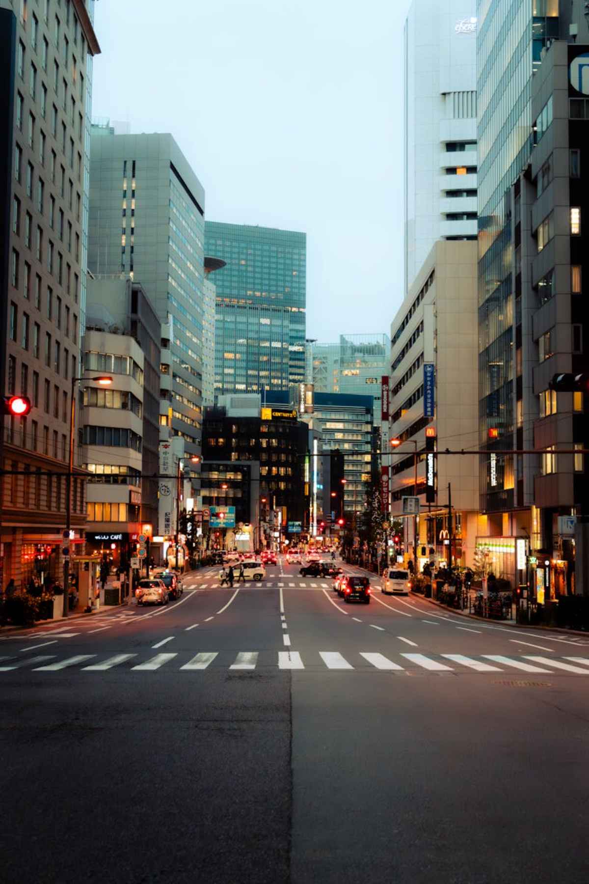 Bustling Tokyo street at dusk modern architecture city life Japan