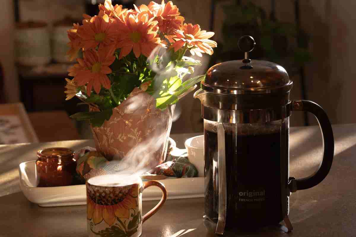 Best Pre Ground Coffee for French Press: Top Picks for a Rich Brew 3 Morning coffee French press on kitchen counter with pre-ground coffee bag nearby
