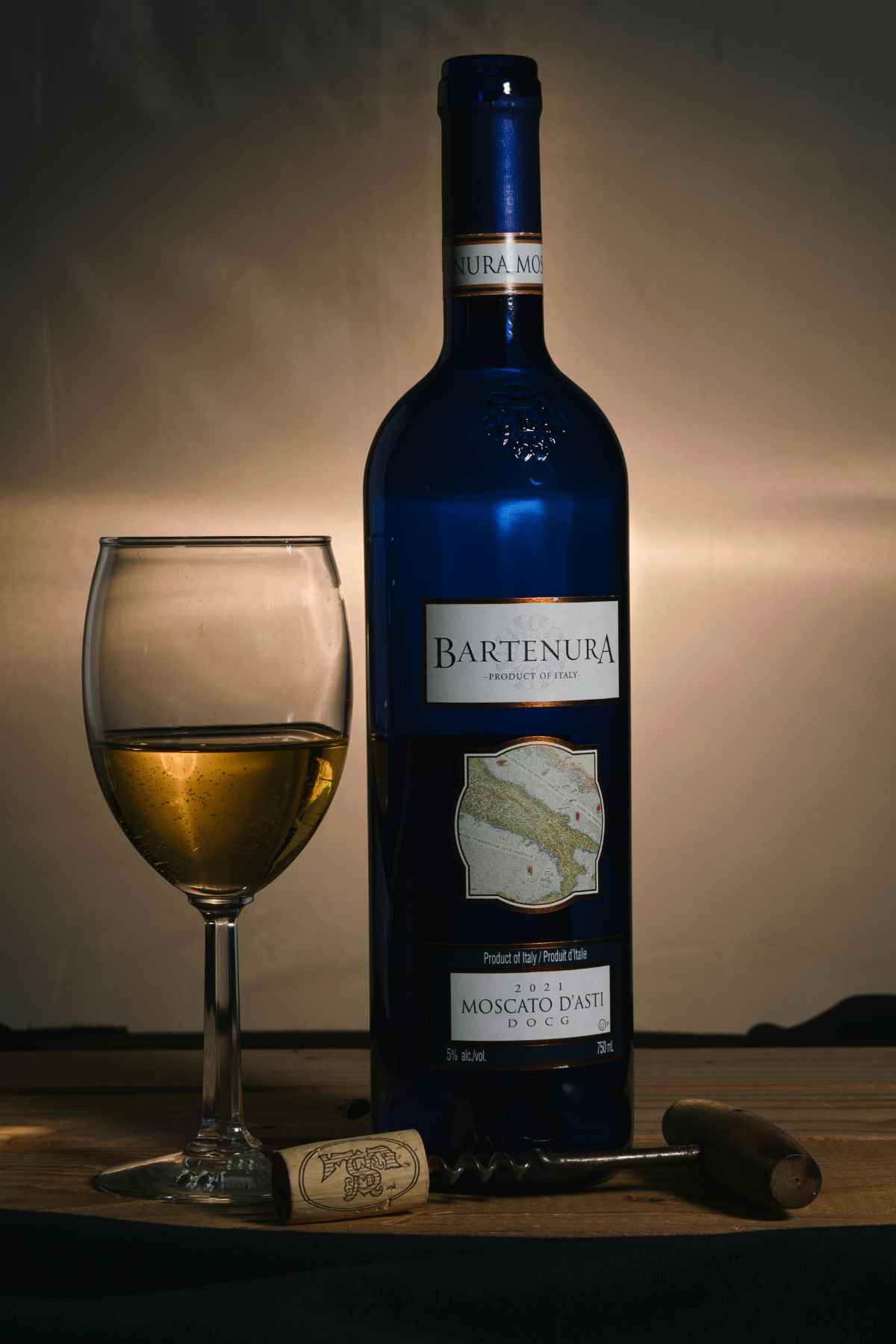 Moscato d'Asti: Complete Guide to Italy's Sweet Sparkling Wine 10 Moscato d'Asti wine bottle and glass Italian sweet sparkling wine