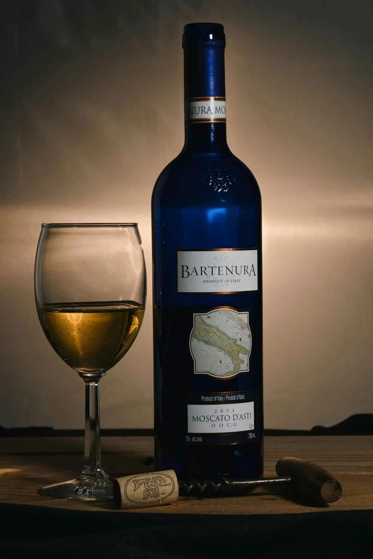 Moscato d'Asti wine bottle and glass Italian sweet sparkling wine