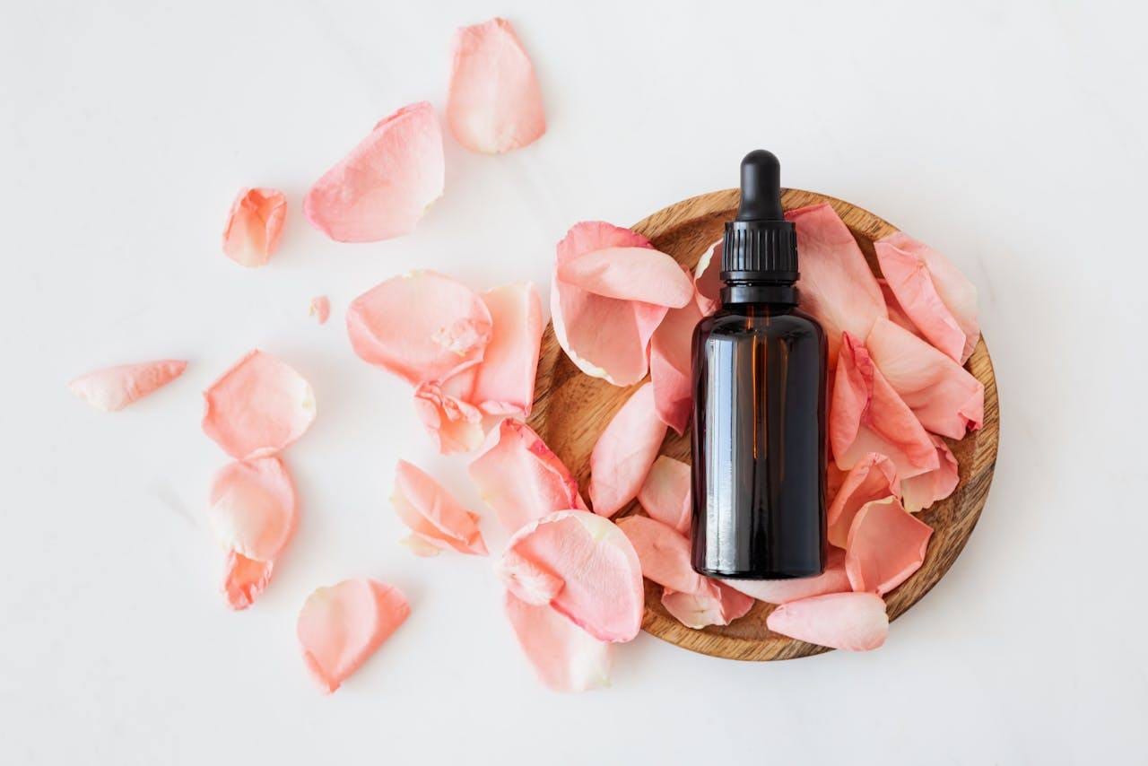 Anti-aging retinol and peptide serum bottles on clean background skincare routine