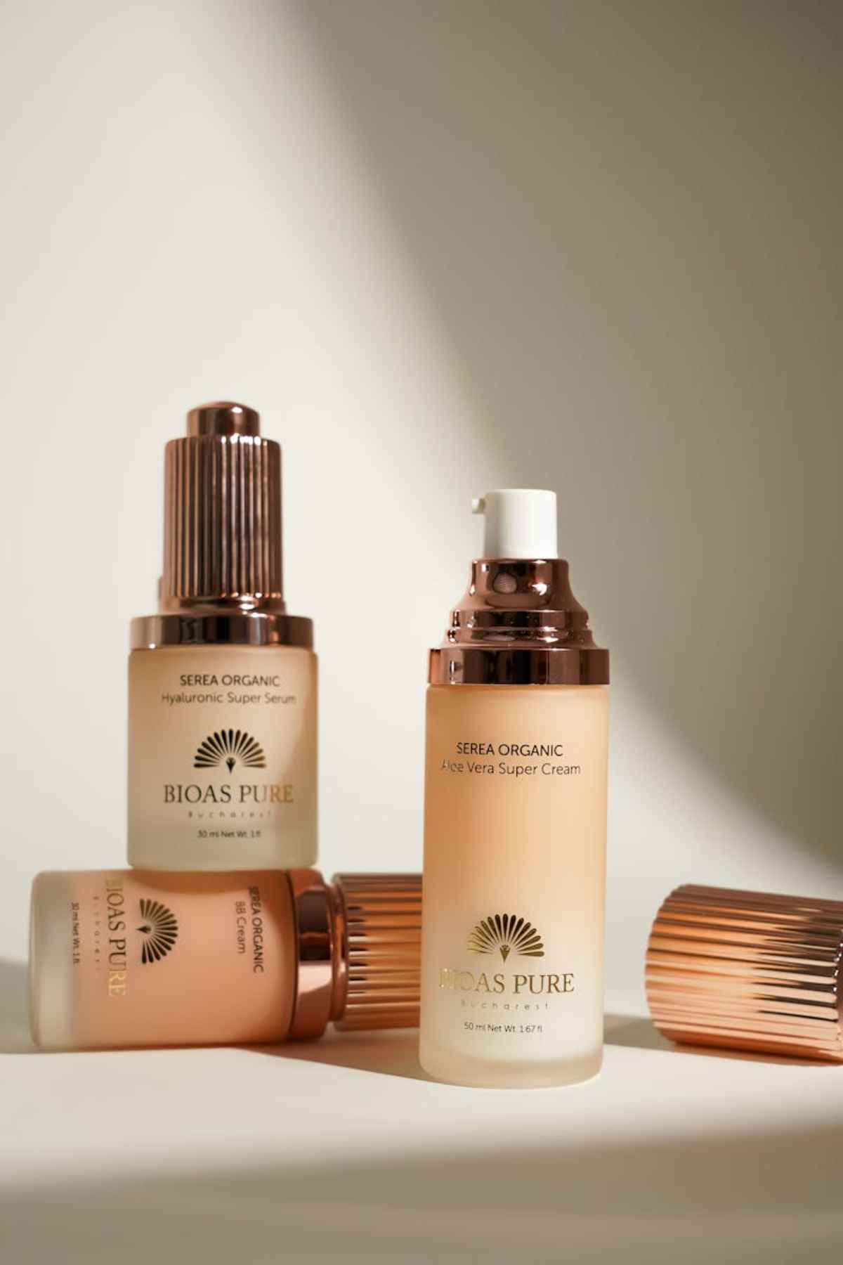 Elegant cosmetic bottles minimalist skincare arrangement