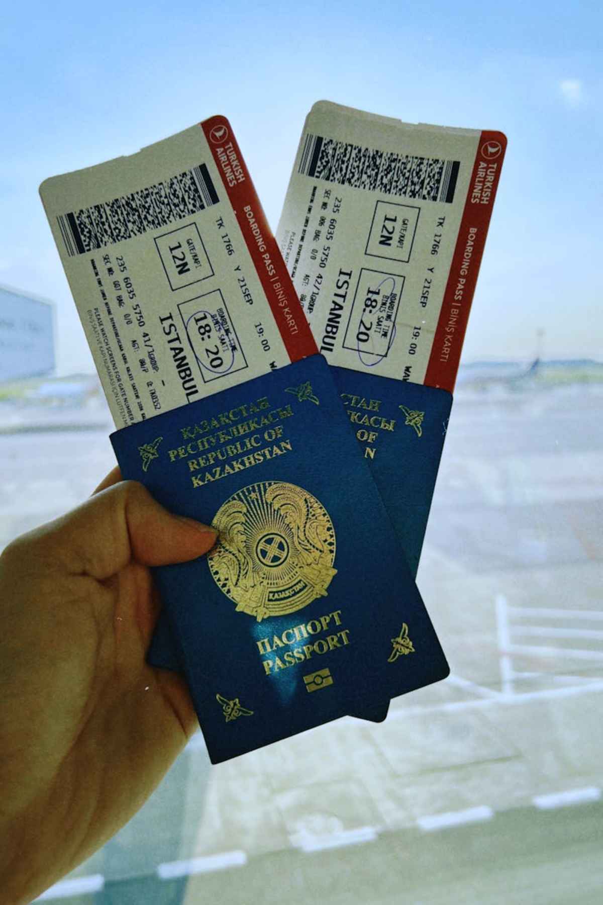 Passport with airline tickets at airport travel