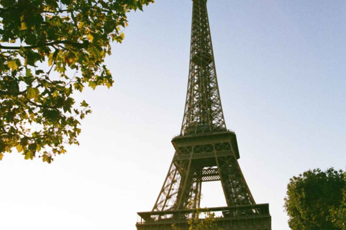 A stunning view of the Eiffel Tower against a sunset sky in Paris, perfect for travel inspiration.