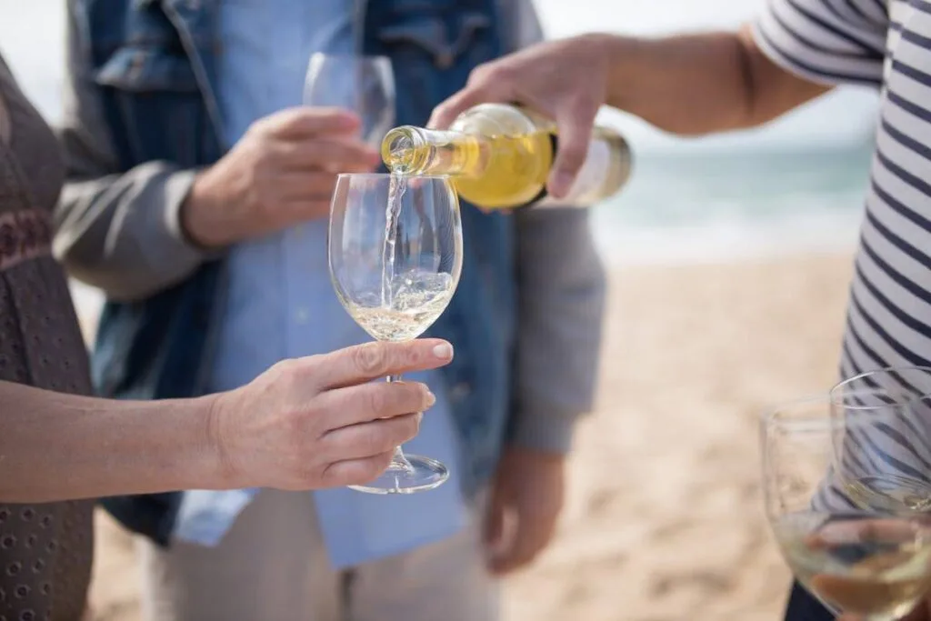 9 Best Yountville Wineries: Napa Valley Wine Country Guide 1 white wine pour at yountville wineries napa valley tasting room california