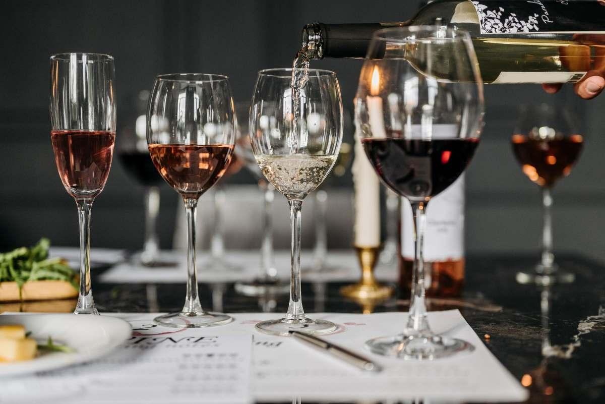 Wineries Springfield MO: Best Local Gems to Visit 3 Red, rose and white wines poured into glasses for an indoor wine tasting